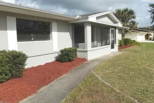 403 Hollywood St, Lehigh Acres, FL 33936-1679