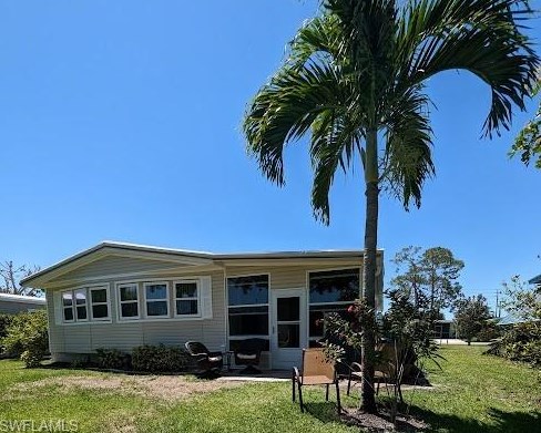 46 Le Mans Dr, Naples FL 34112-9127 exterior