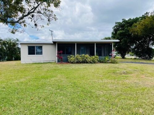 5566 Honeysuckle Dr, West Palm Beach, FL 33415-6326