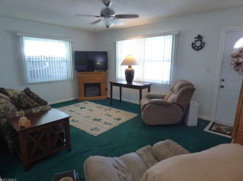 5 Meadow Rue Ct, Lehigh Acres FL  33936-7303 exterior