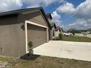 427 Shadow Lakes Dr, Lehigh Acres FL  33974-0827 exterior