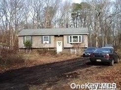 7 Pond Ln, Panamoka, NY 11961-2634