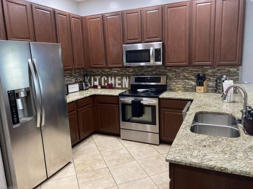 8213 Silver Birch Way, Lehigh Acres FL  33971-3721 exterior