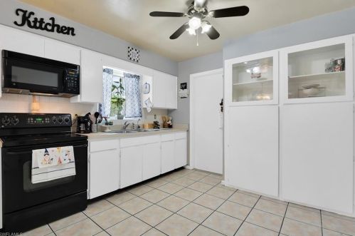 102 Stafford Pl, Lehigh Acres FL 33936-5954 exterior