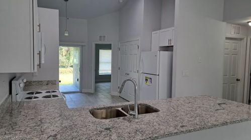 2107 Fairway Dr, Lehigh Acres FL  33973-6233 exterior