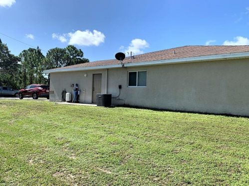 712 Holmes Ave, Lehigh Acres FL 33974-5500 exterior