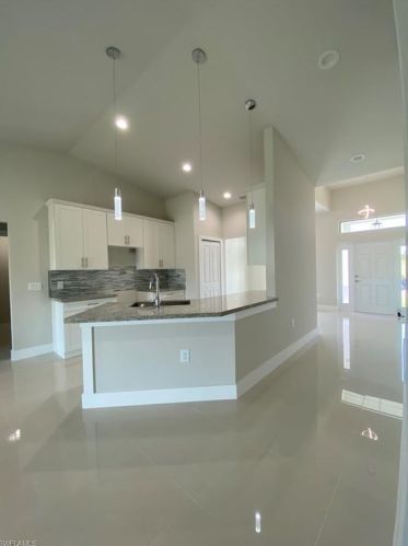 1702 13 St, Lehigh Acres FL 33972-8758 exterior