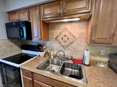 28 Desert Candle Cir, Lehigh Acres FL 33936-7362 exterior