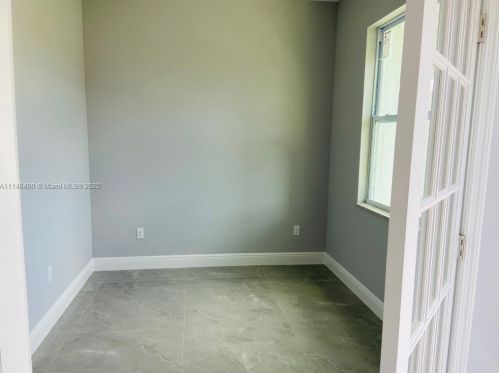 1821 Ridgemoor St, Lehigh Acres FL 33972-1080 exterior