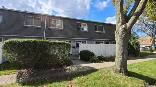97 Storm Dr, Holtsville, NY 11742-1911