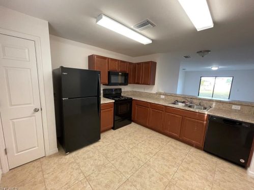 128 Shadow Lakes Dr, Lehigh Acres FL  33974-0803 exterior