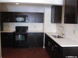 24-8 Great Wood Ct, Fairport NY  14450-2769 exterior