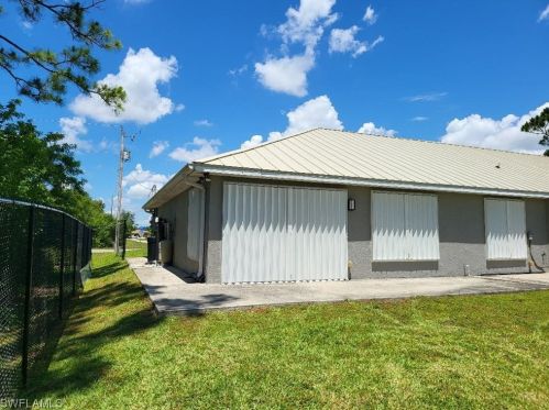 387 Carrillon Ave, Lehigh Acres FL  33974-5902 exterior