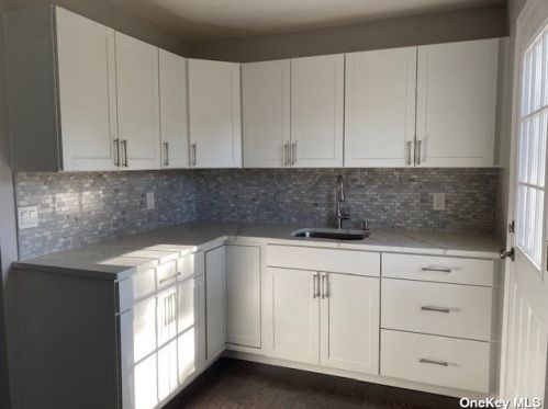 56 32nd St, Copiague, NY 11726-2518