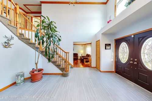 65 Tricentennial Dr, East Freehold, NJ 07728-5328
