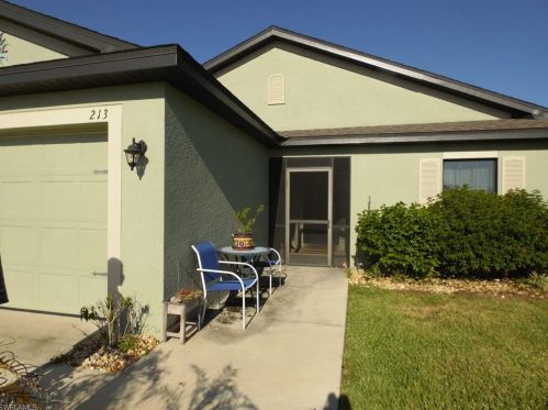 213 Shadow Lakes Dr, Lehigh Acres FL  33974-0806 exterior