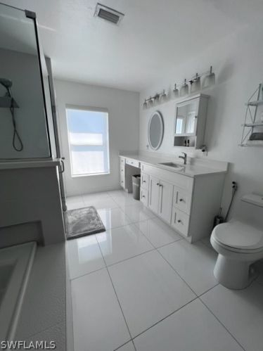 1041 Cedartree Ave, Lehigh Acres FL 33971-7590 exterior