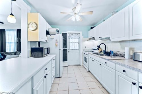 18 Dawn Flower Cir, Lehigh Acres FL 33936-7355 exterior