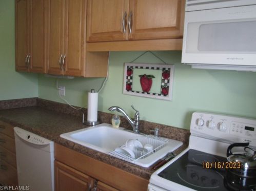 25 Dawn Flower Cir, Lehigh Acres FL 33936-7356 exterior