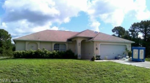 831 Chezy St, Lehigh Acres, FL 33974-9545