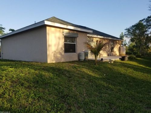 1119 Hamilton Ave, Lehigh Acres FL 33972-2525 exterior