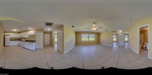 217 Ivan Ave, Lehigh Acres FL 33973-2011 exterior