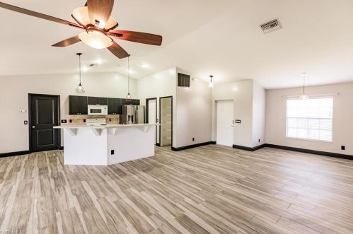 214 25th Ave, Cape Coral, FL 33993-7575