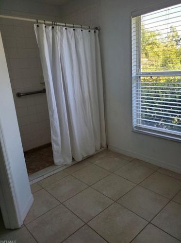 518 Aspen Ave, Lehigh Acres FL 33974-9613 exterior