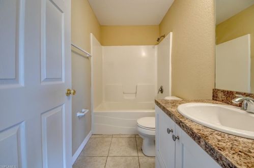 217 Ivan Ave, Lehigh Acres FL 33973-2011 exterior