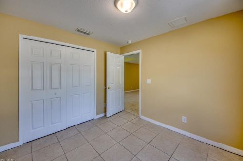 217 Ivan Ave, Lehigh Acres FL 33973-2011 exterior