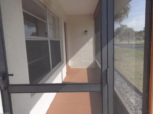 13 Parkwood Villas Ct, Lehigh Acres, FL 33936-5863