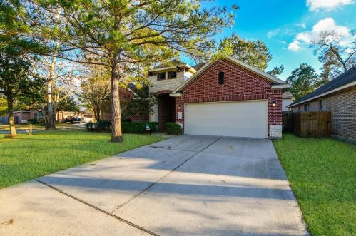 110 Sweet Leaf Grove Ln, Conroe TX  77384-3755 exterior