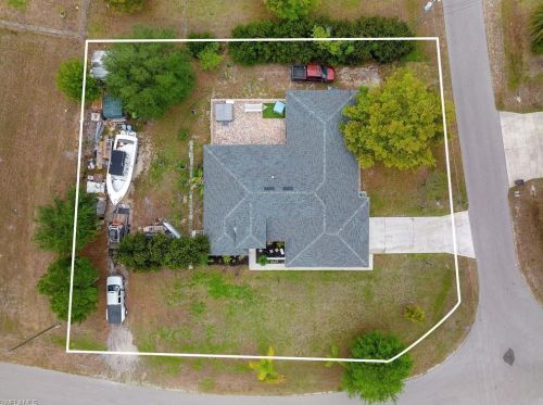 1023 Carl Ave, Lehigh Acres FL 33971-8523 exterior