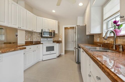 7718 Pine Island Way, West Palm Beach FL  33411-5802 exterior