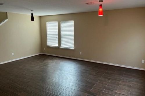 2435 Castle Pines Dr, Burleson TX  76028-7899 exterior