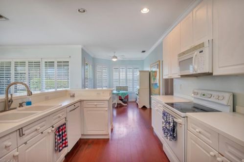 23379 Olde Meadowbrook Cir, Bonita Springs FL 34134-9115 exterior