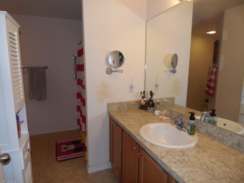 213 Shadow Lakes Dr, Lehigh Acres FL  33974-0806 exterior