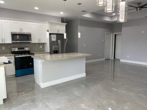 1821 Ridgemoor St, Lehigh Acres FL 33972-1080 exterior