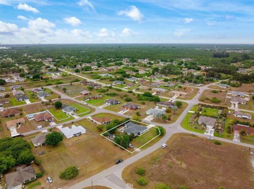 1023 Carl Ave, Lehigh Acres FL 33971-8523 exterior