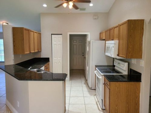 555 Kingsbury Ln, Lehigh Acres, FL 33974-4756