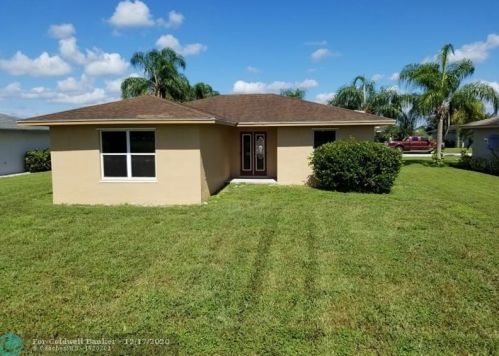 144 Dabou Loop, Belle Glade, FL 33430-4279