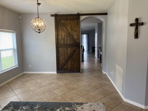 8213 Silver Birch Way, Lehigh Acres FL  33971-3721 exterior