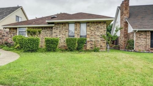 2135 Cordoba Dr, Carrollton TX  75006-1897 exterior