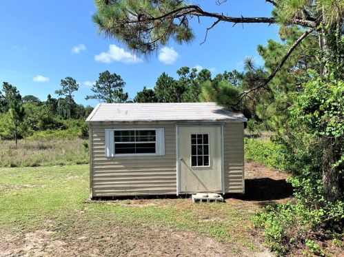 712 Holmes Ave, Lehigh Acres, FL 33974-5500