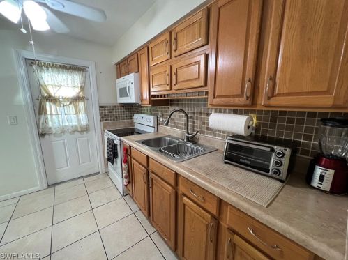 14 Desert Candle Cir, Lehigh Acres FL 33936-7360 exterior