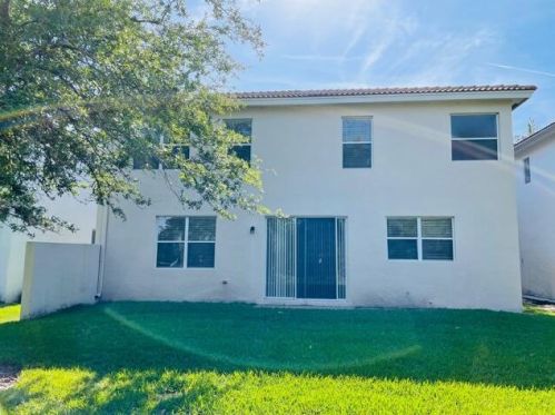 906 Gazetta Way, West Palm Beach, FL 33413-1059