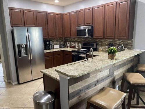 8213 Silver Birch Way, Lehigh Acres FL  33971-3721 exterior