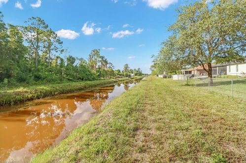 1118 Alaska Ave, Lehigh Acres FL 33971-6460 exterior