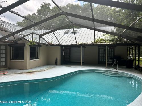 6100 Tropical Trl, Merritt Island, FL 32953-7213
