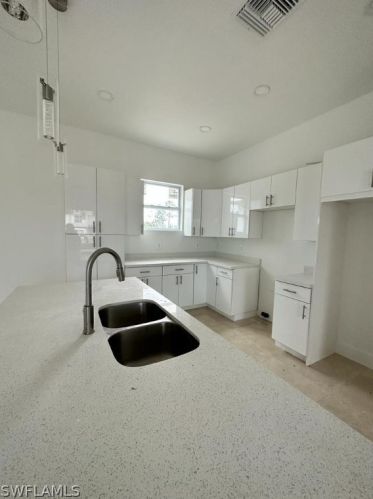 1413 Poinsettia Ave, Lehigh Acres, FL 33972-8416
